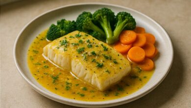 Baked cod with saffron lemon sauce — finished dish