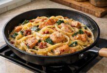 creamy tuscan salmon pasta — finished dish